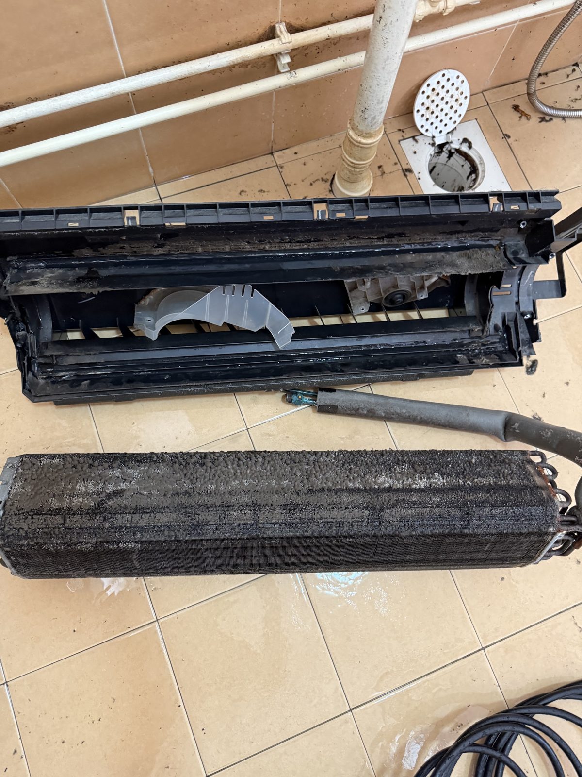 Aircon internals stripped down for cleaning